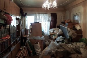 inside a hoarder home with excessive items in the living room