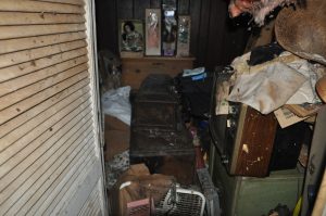 hoarding inside a home with junk everywhere in the way