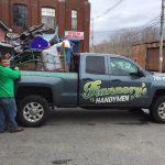 Flannery's worker filling up his truck with hoarder items