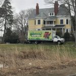 Flannery's moving truck outside a home ready for a move