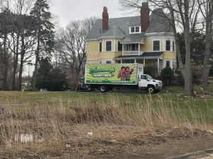 Flannery's moving truck outside a home ready for a move