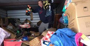 Todd Flannery helping a hoarder family with excessive items