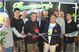 The team at Flannery's cutting the opening ribbon