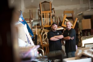 Todd and Rory Flannery inside a messy home