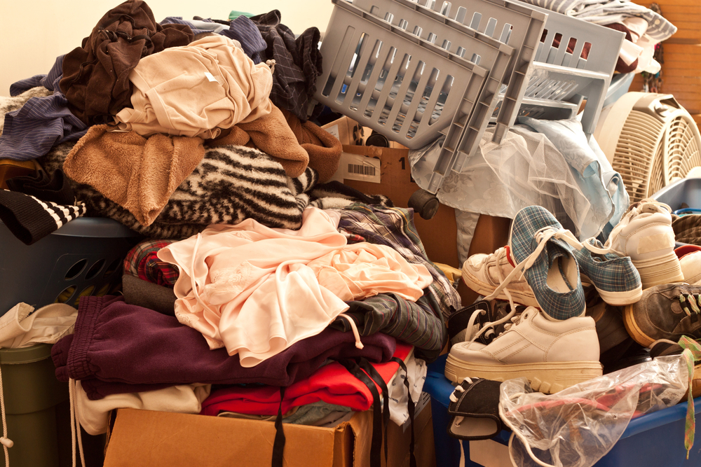 items stacked up inside a hoarder home taking up space