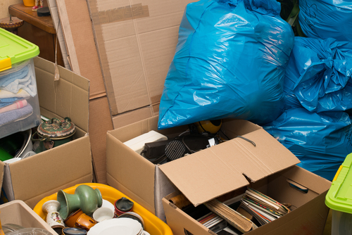 bunch of boxes and items being prepared for a move