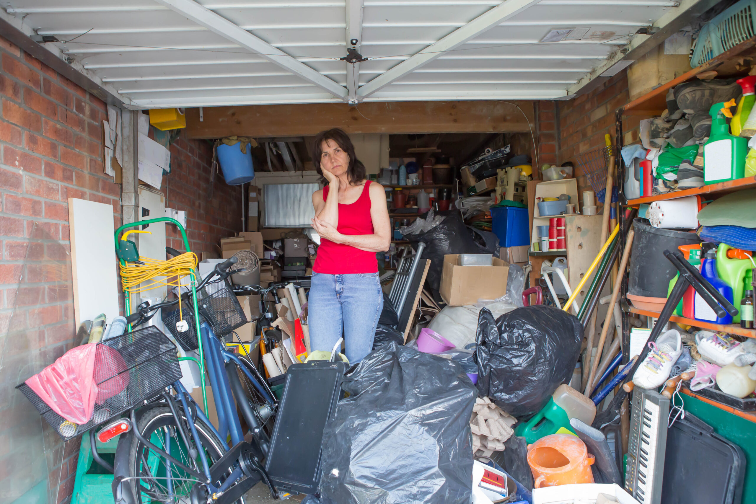 woman in her hoarded garage